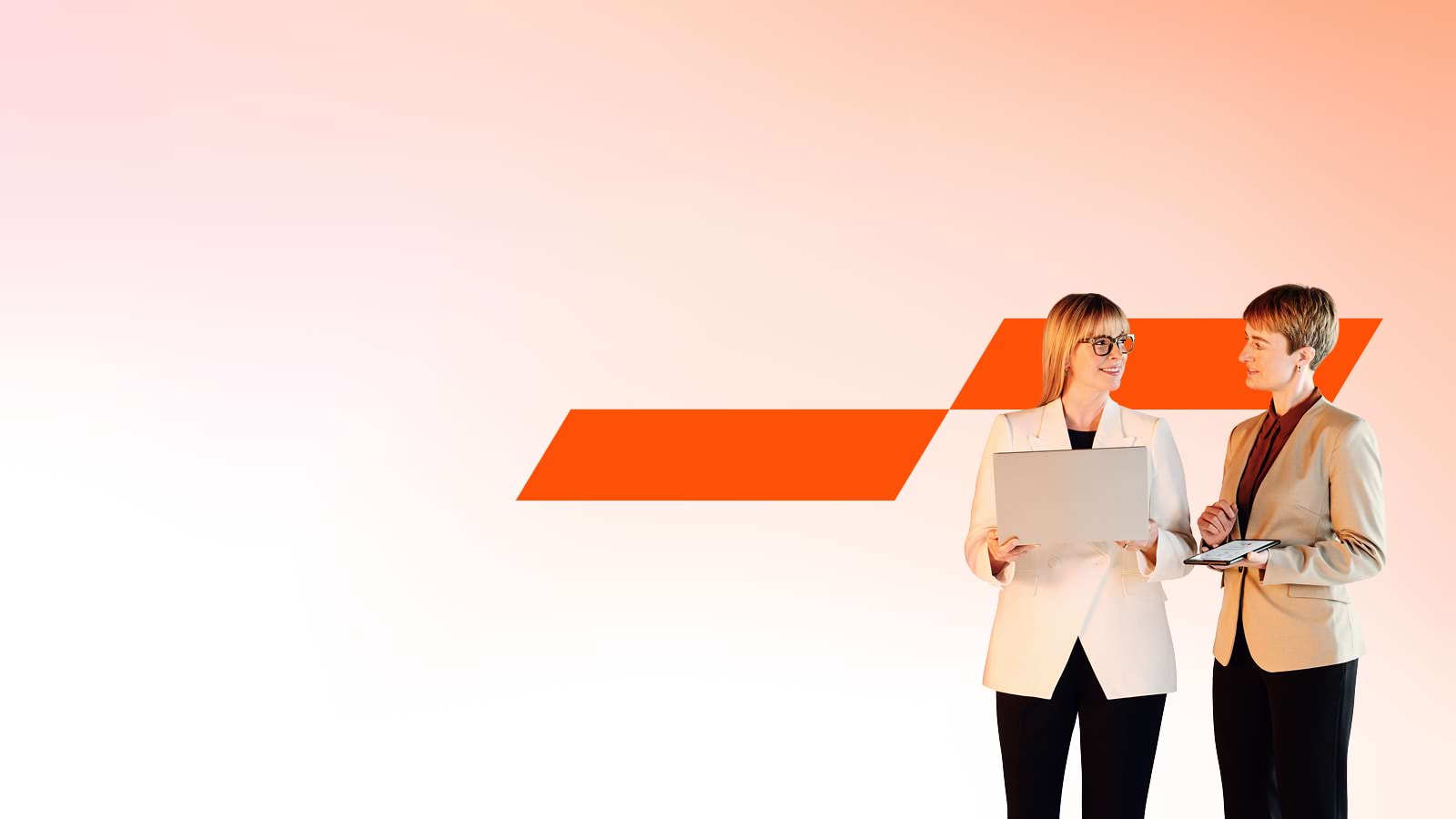 Man and woman looking at a laptop